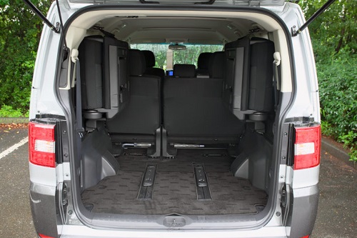Like a minivan, the storage space is the upper glove box around the front seats.