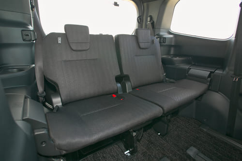 Noah/Voxy's 7-passenger second row has captain seats and a back door.